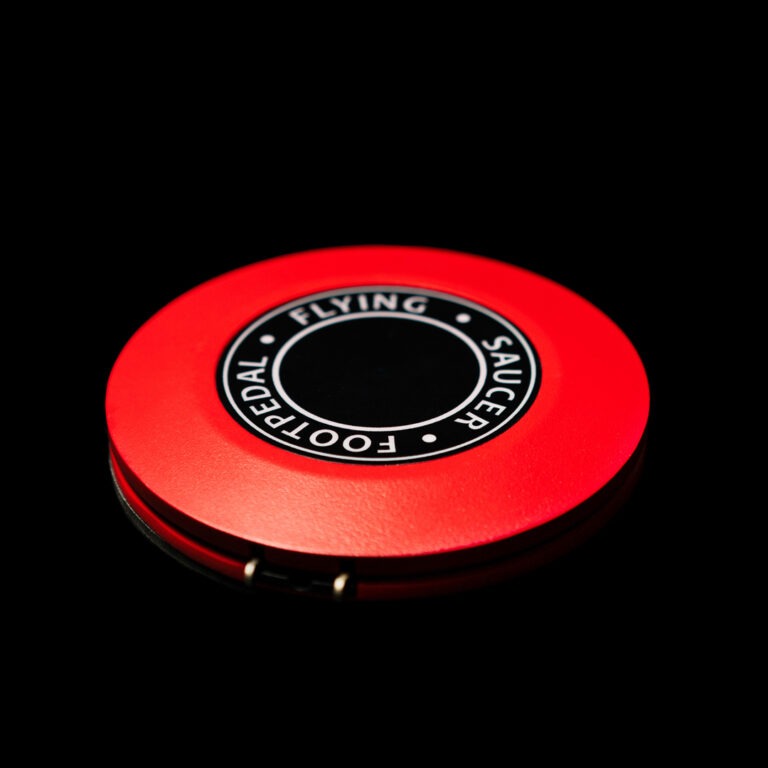 Dragonhawk Flying Saucer Footswitch Pedal is a round aluminum switch with non slip base and clip cord connection for consistent studio control