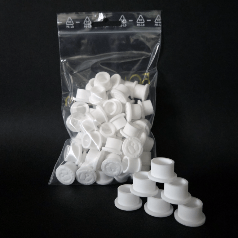 Silikoonist värvikapsid ink caps 50 tk valged tatoveerimiseks pakendis